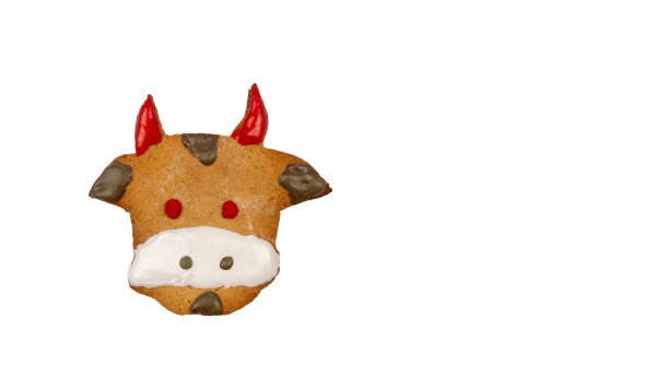 istock ginger cake in the shape of a bull's face on a white background 1283518880