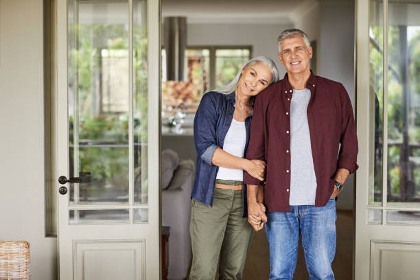 istock Smiling mature couple in balcony during lockdown 1283520718