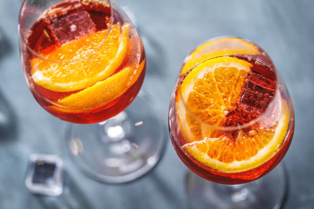 istock Spritz cocktail with orange slices served in glasses. 1283522239