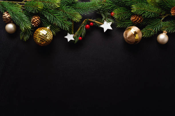istock Christmas deco with fir and baubles on dark 1283522972