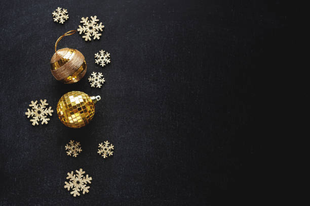 istock Christmas deco with fir and baubles on dark 1283523000
