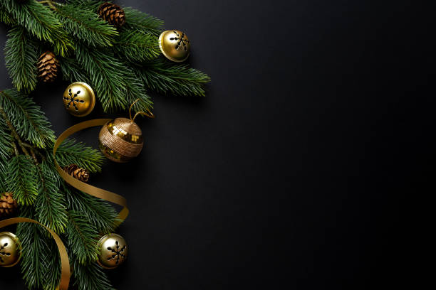 istock Christmas deco with fir and baubles on dark 1283523040