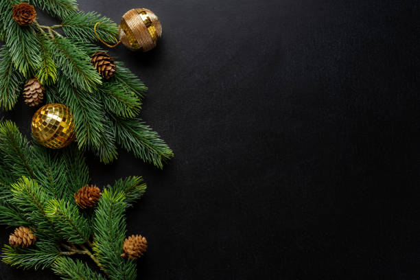 istock Christmas deco with fir and baubles on dark 1283523090