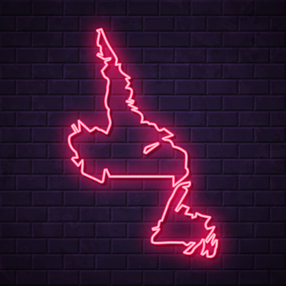 Map of Newfoundland and Labrador in a realistic neon sign style. The map is created with a pink glowing neon light on a dark brick wall. Modern and trendy illustration with beautiful bright colors. Vector Illustration (EPS10, well layered and grouped). Easy to edit, manipulate, resize or colorize.