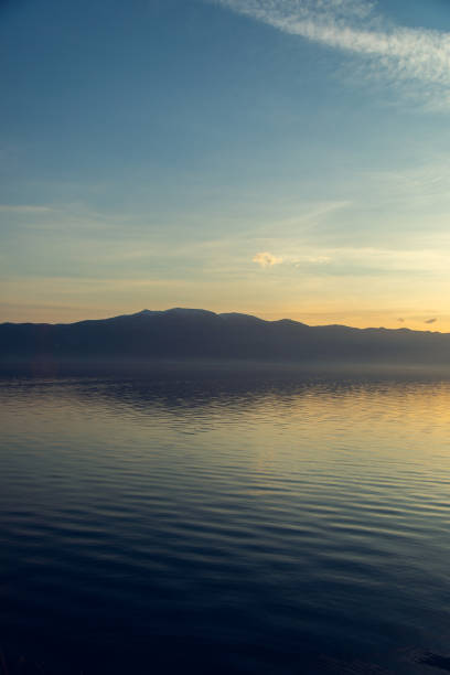 istock lake and mountain at the sunset 1283524368