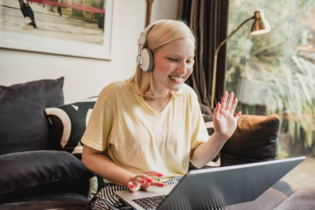 istock A young woman is using laptop at home 1283526192