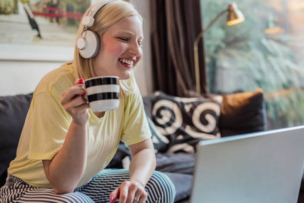 istock A young woman is using laptop at home 1283526194
