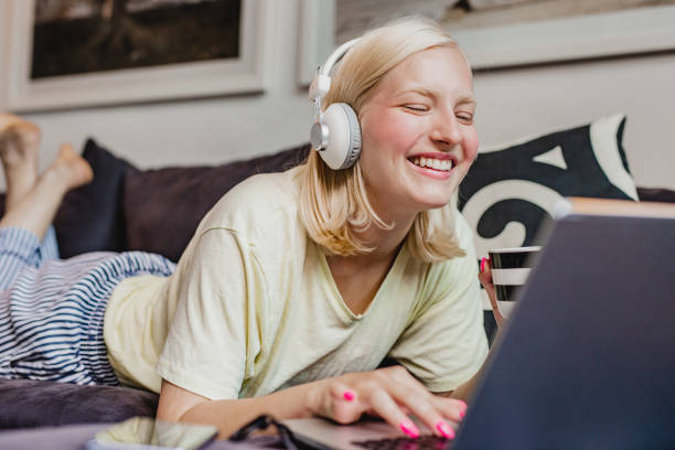 istock A young woman is using laptop at home 1283526485