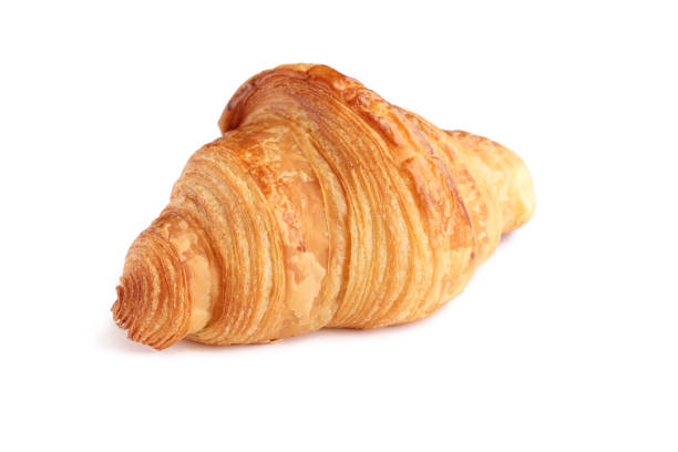istock One freshly backed french croissant. Puff pastry. 1283526922