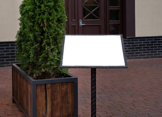 istock Blank restaurant advertising board as copy space on the street. 1283527645