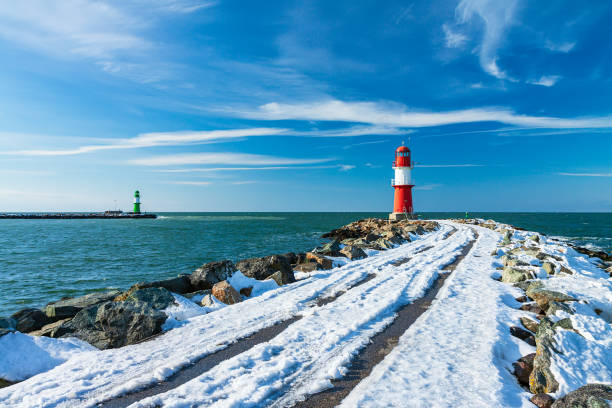 istock The mole in winter time in Warnemuende, Germany 1283527741