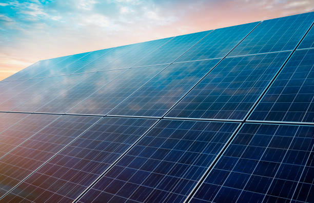 istock Photovoltaic system at sunrise 1283528138