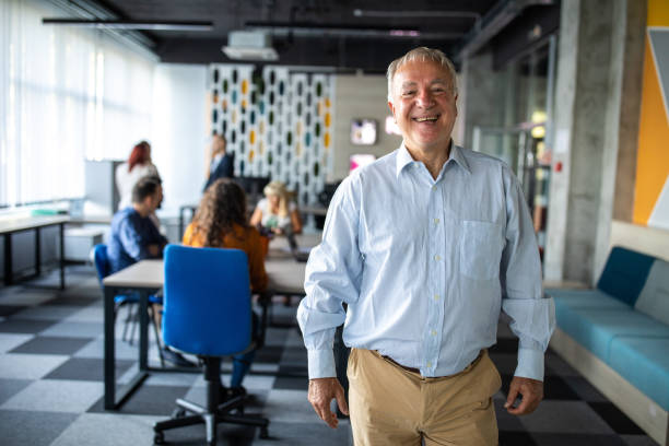 istock Senior businessman in modern workplace 1283528676