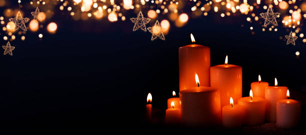 istock Burning candles in christmas night 1283529463