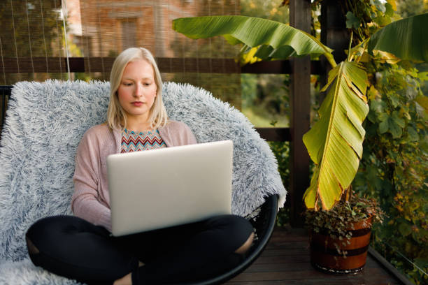 istock Young woman working from home 1283529906