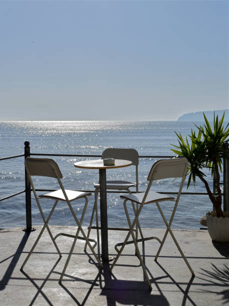 istock Chairs by the sea 1283531651