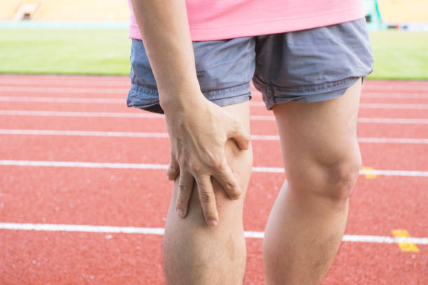 istock Tendon knee joint problems on Man leg from exercise In the stadium. 1283531861