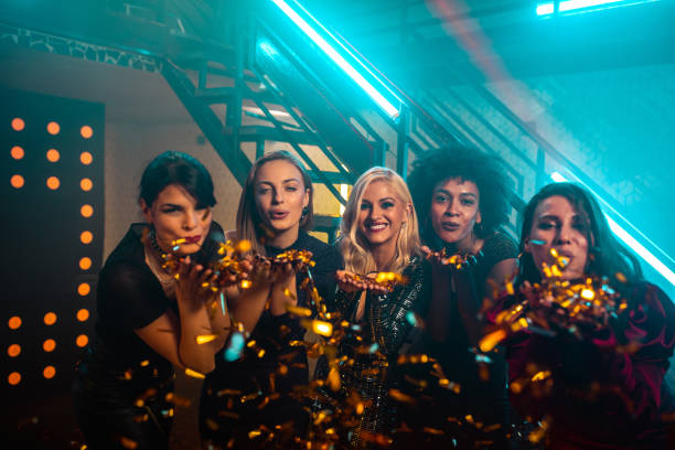 istock Girls just wanna blow some confetti 1283535407
