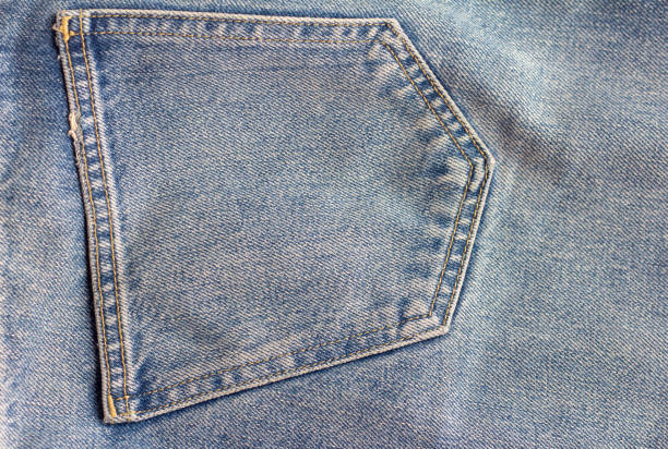 istock Blue denim, texture, pocket on the back of jeans. 1283540921