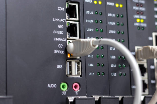 istock Network cable in the data center. Data transmission over fiber optic information technology. Selective focus. 1283541183