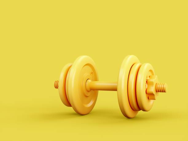 istock 3D rendering Yellow Dumbbells isolated on yellow background 1283541386