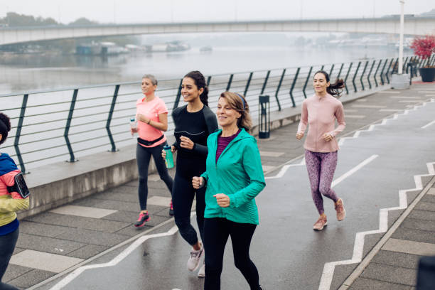istock Group of female runners training on a cold day 1283541828