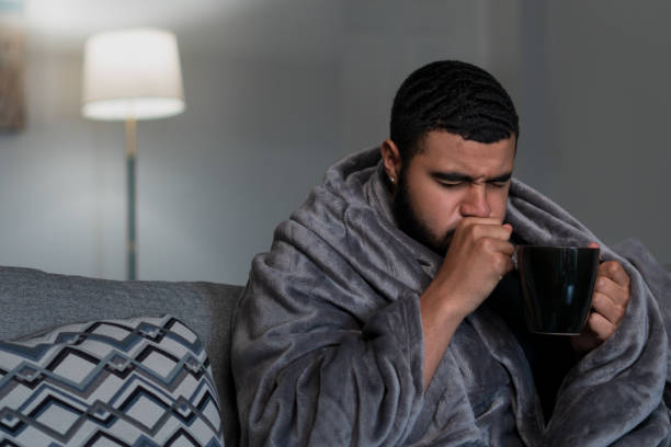 istock Sick man recovers at home 1283545051