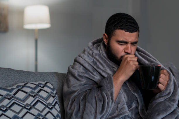 istock Sick man recovers at home 1283545056