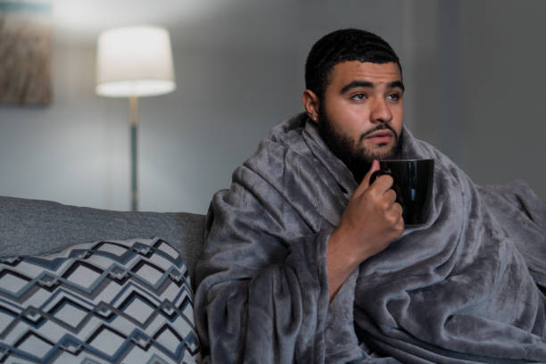 istock Sick man recovers at home 1283545061