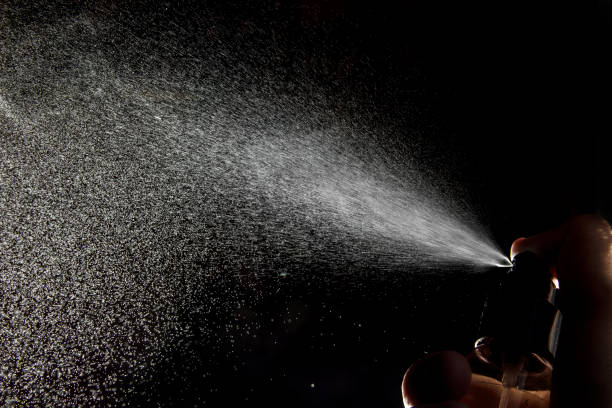 istock Spraying antibacterial agents on hands to prevent Covid-19. 1283545081
