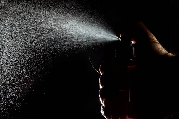 istock Spraying antibacterial agents on hands to prevent Covid-19. 1283545177
