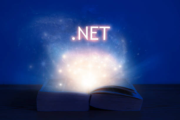 istock Open book with dot net inscription. Light coming from open book with words .NET 1283545200