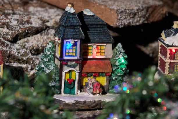 istock Toy fabulous Christmas house. Christmas composition on a dark background 1283546206