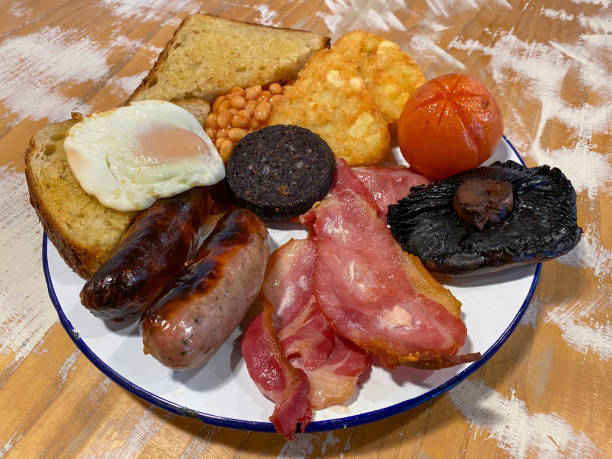 Traditional English breakfast Traditional English breakfast with black pudding english breakfast stock pictures, royalty-free photos & images