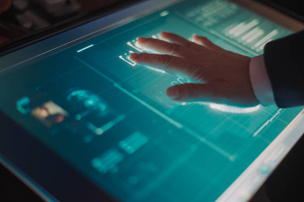 istock hand of asian chinese with blazer put on scanner device screen for security check access 1283547555