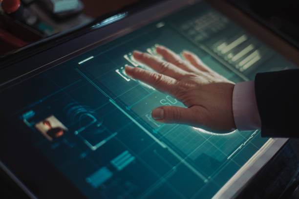 istock hand of asian chinese with blazer put on scanner device screen for security check access 1283547558