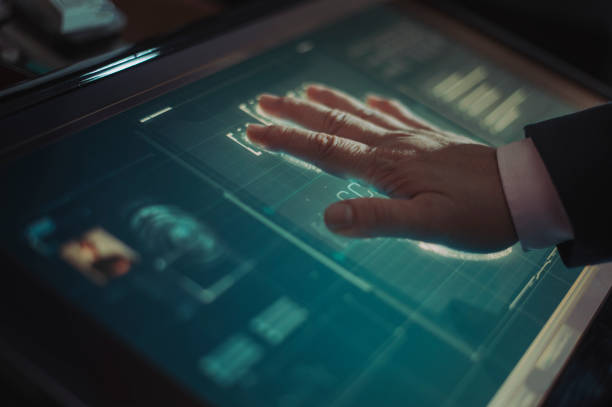 istock hand of asian chinese with blazer put on scanner device screen for security check access 1283547565