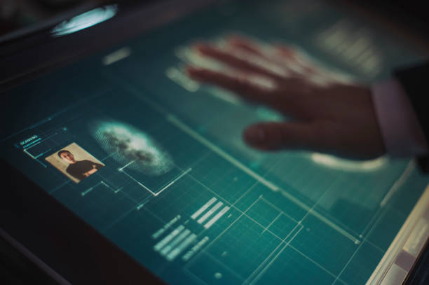 istock hand of asian chinese with blazer put on scanner device screen for security check access 1283547586