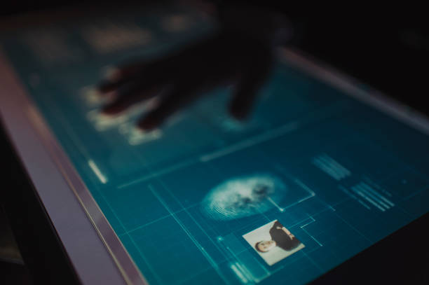 istock hand of asian chinese with blazer put on scanner device screen for security check access 1283547619