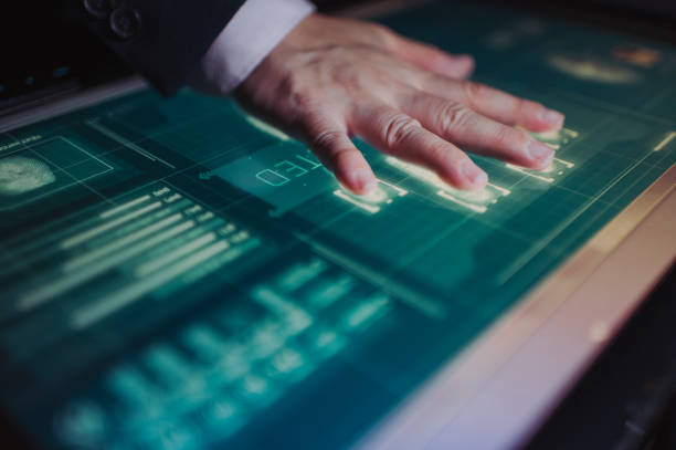 istock hand of asian chinese with blazer put on scanner device screen for security check access 1283547643