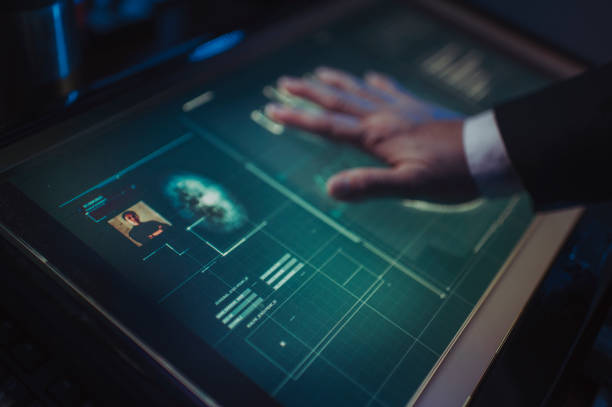 istock hand of asian chinese with blazer put on scanner device screen for security check access 1283547663