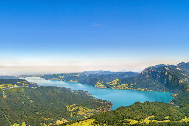 View of Attersee from Schafberg mountain, Austria View of Alps mountain with Attersee lake from Schafberg mountain, Austria attersee stock pictures, royalty-free photos & images
