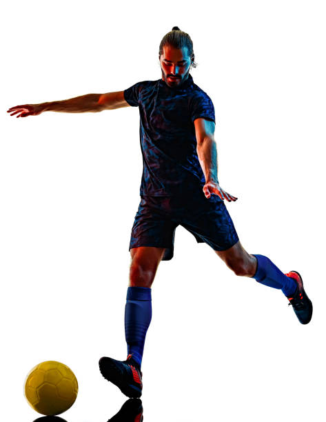 istock young soccer player isolated white background silhouette shadow 1283551345