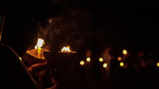 istock Blur candles in the dark background. 1283554226