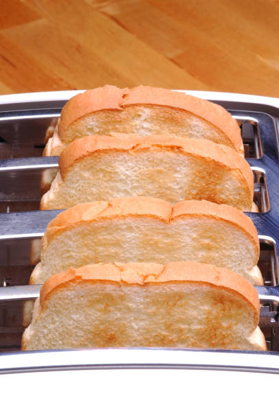istock Closeup of fresh made toast for breakfast. 1283557415