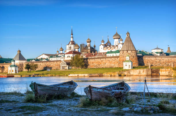 istock Solovetsky Monastery and old wooden boats on the shore 1283561553