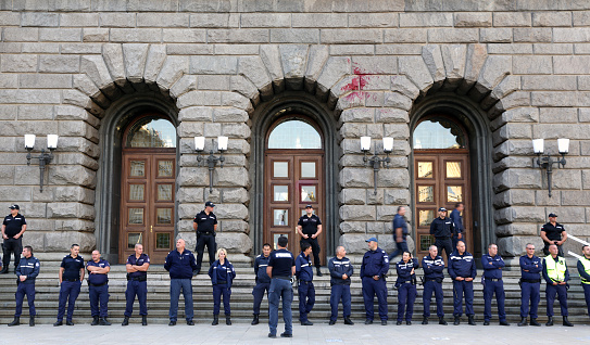 Sofia, Bulgaria - 2 September, 2020: Policemen and policewomen guard the parliament building during an anti-government protest.