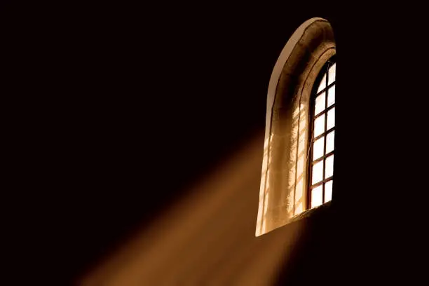 Photo of church window with god light