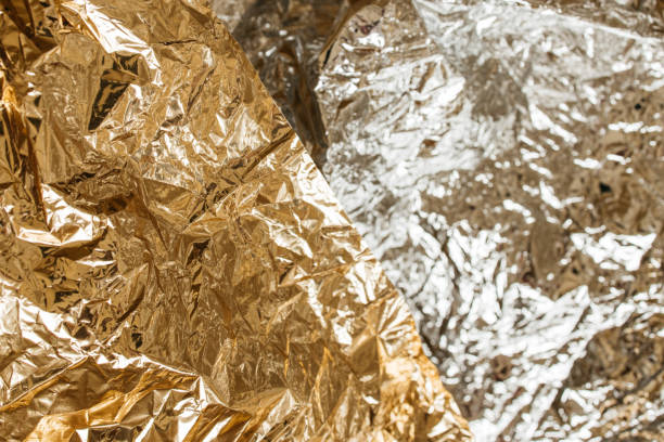 istock shiny gold crumpled foil grunge texture 1283566840