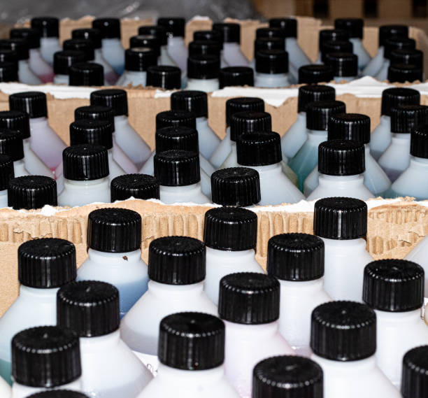 istock Multicollored chemicals in plastic botles with black plastic cork 1283571285
